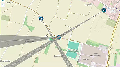 Automated Direction Finding and Geolocation Map view with direction lines intersecting to geolocate an RF emission source.